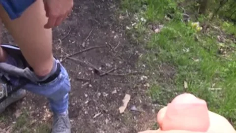Czech lad with nice blond hair drills in a park