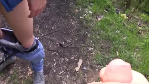 Czech lad with nice blond hair drills in a park